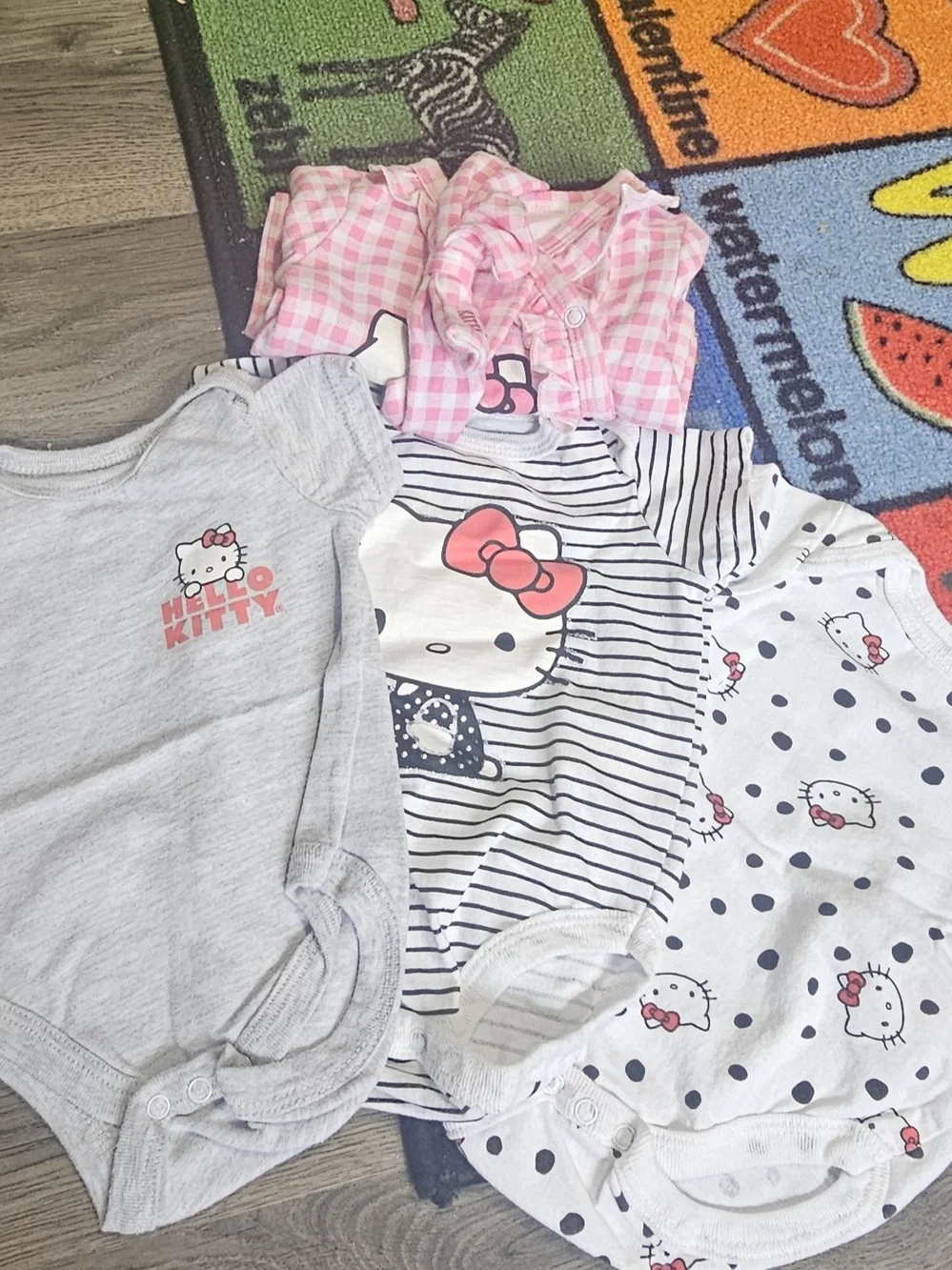 Hello Kitty Baby One-Piece Bodysuits in Pink, Gray, White and Navy
